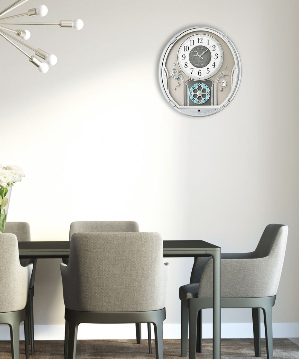 16"H Melodies in Motion Clock  with 18 Melodies