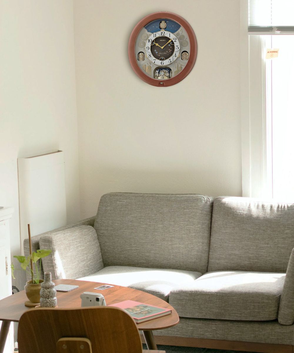 18"H Melodies in Motion Clock  with 18 Melodies