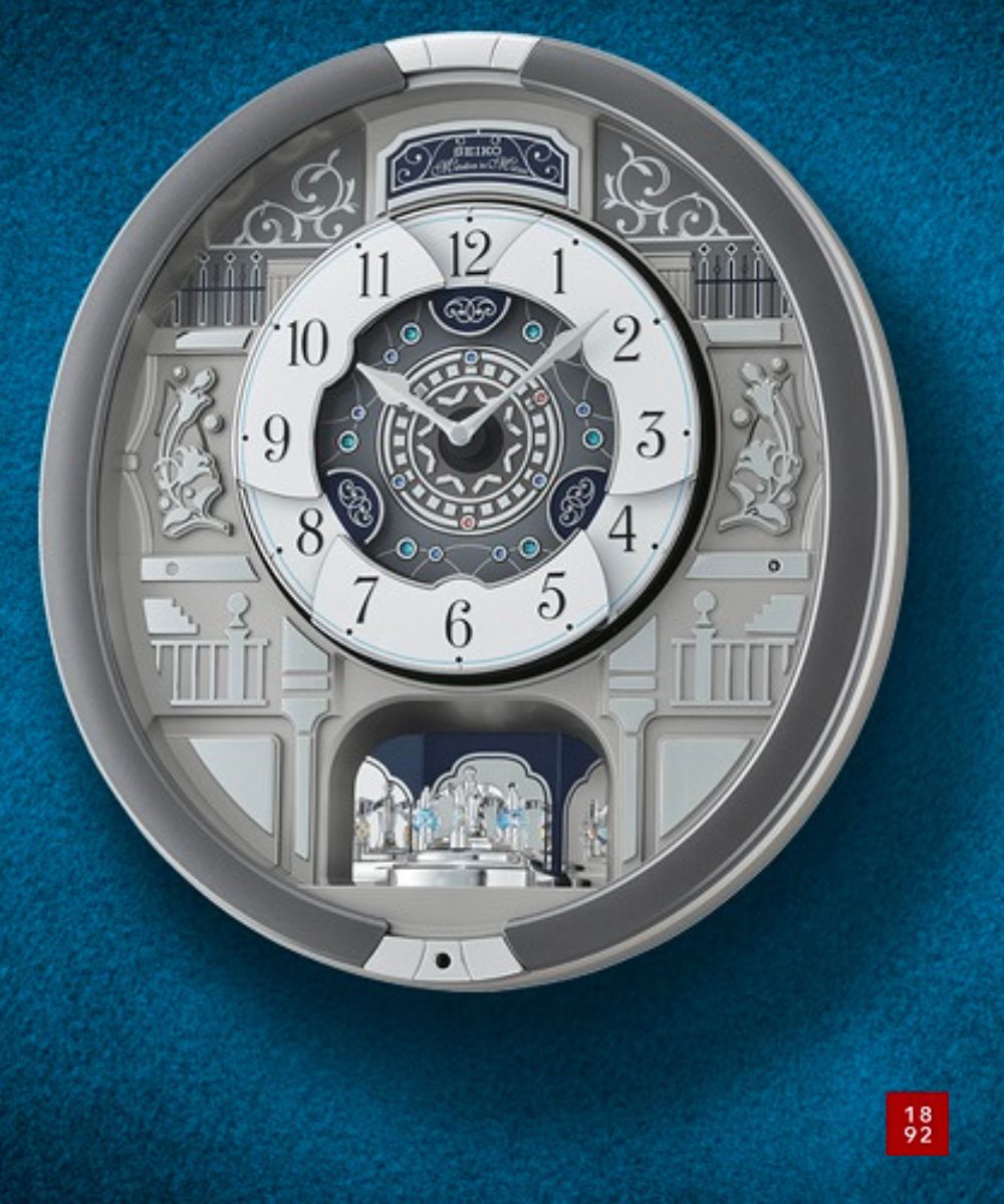 16"H Melodies in Motion Clock  with 18 Hi Fi Melodies  Rotating Pendulum