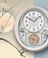 17"H Melodies in Motion Clock  18 Hi Fi Melodies Rotating Pendulum