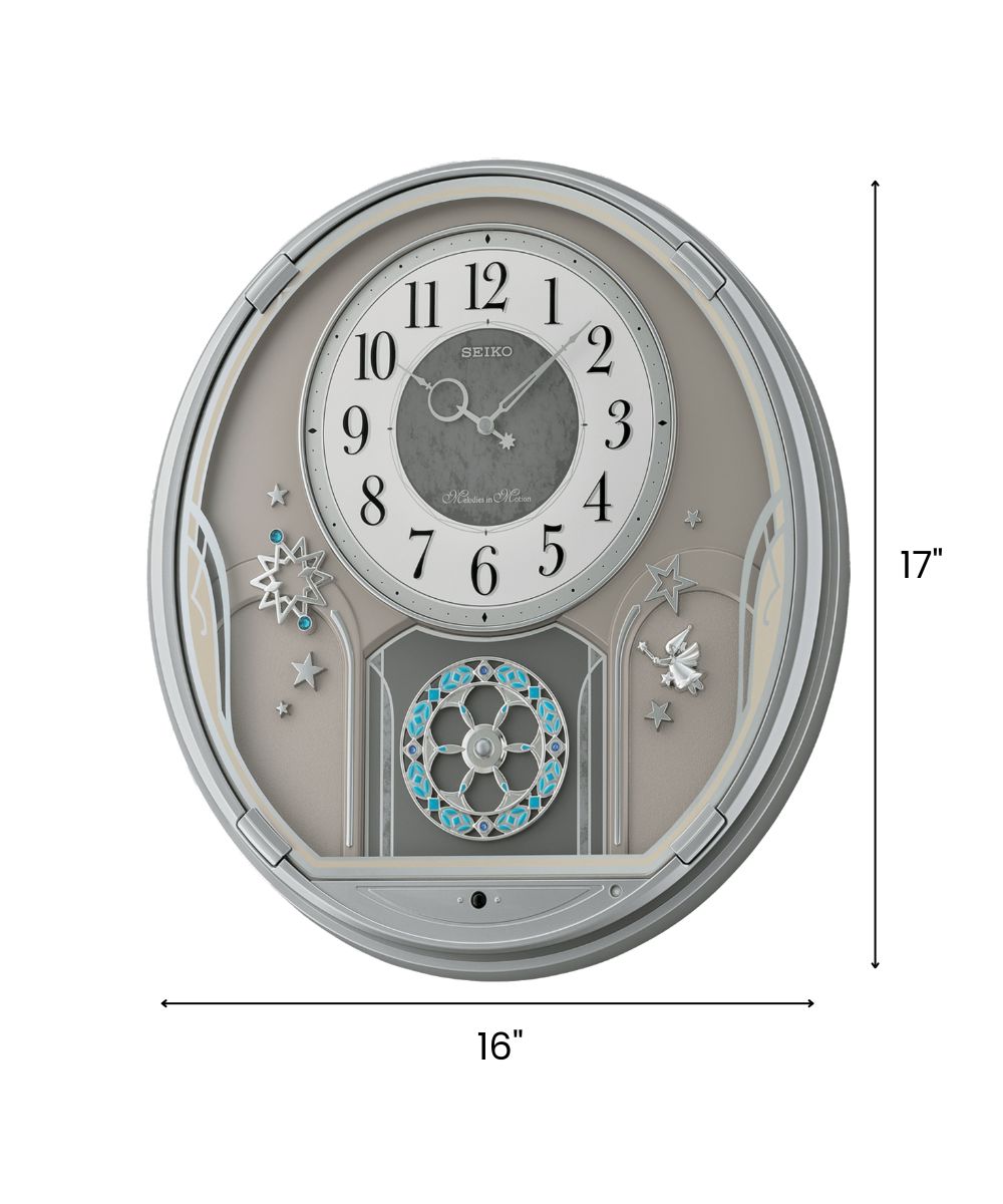16"H Melodies in Motion Clock  with 18 Melodies